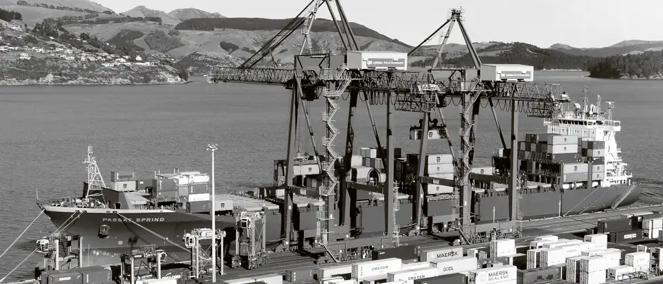 Container ship under way at sea with a full deck load